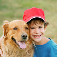 Boy And Golden Retriever